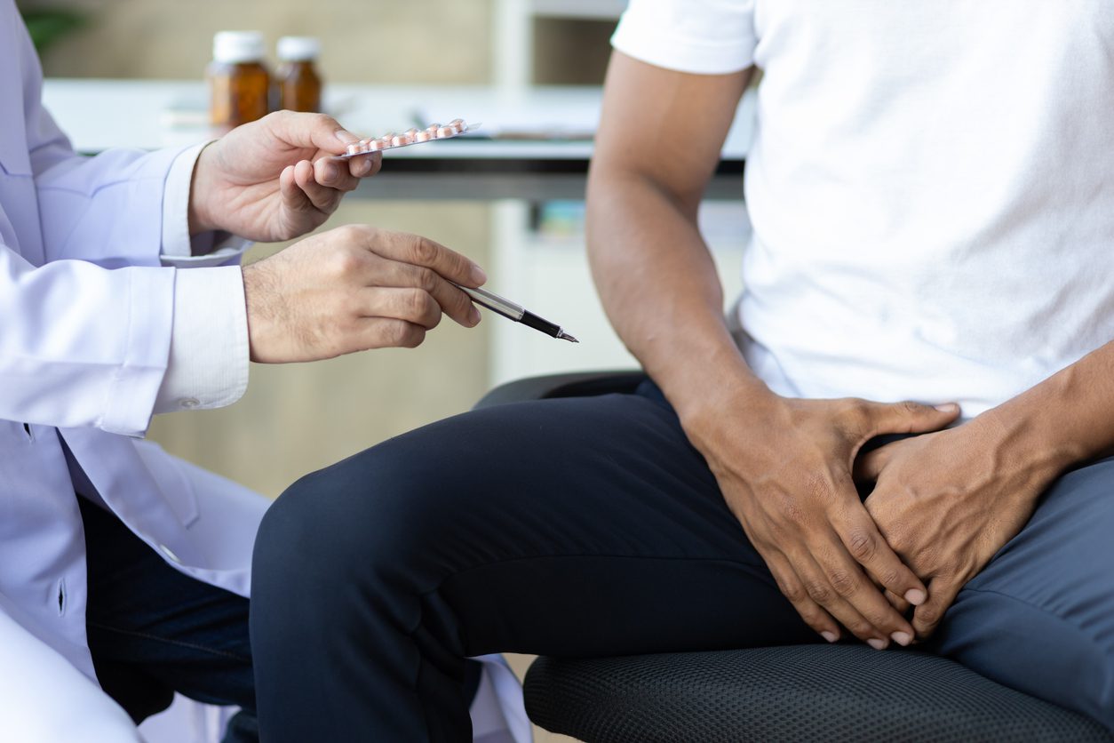 Specialist doctors are diagnosing male patients with symptoms of sexual dysfunction and providing health counseling and medicine. Male health problems.